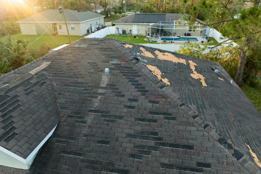 Current image: Calgary hail damage roof repair with shingles and gutters inspected after a hailstorm