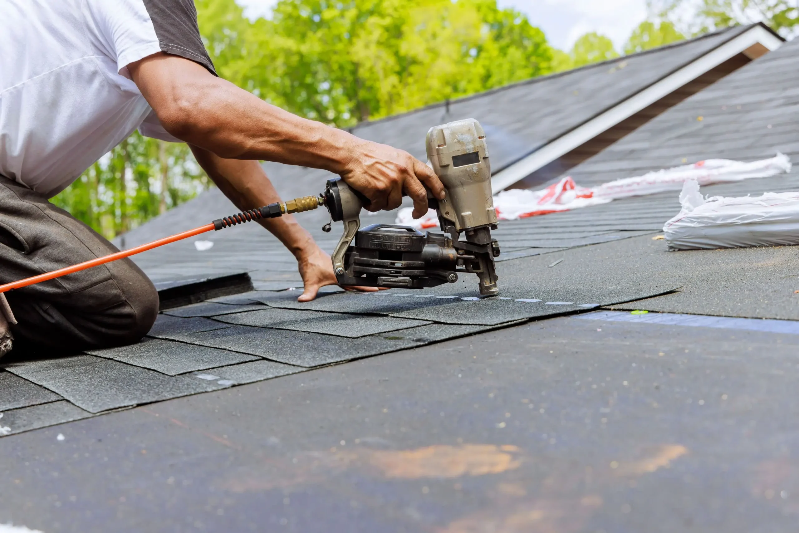 Calgary home showing visible signs of roof wear before winter